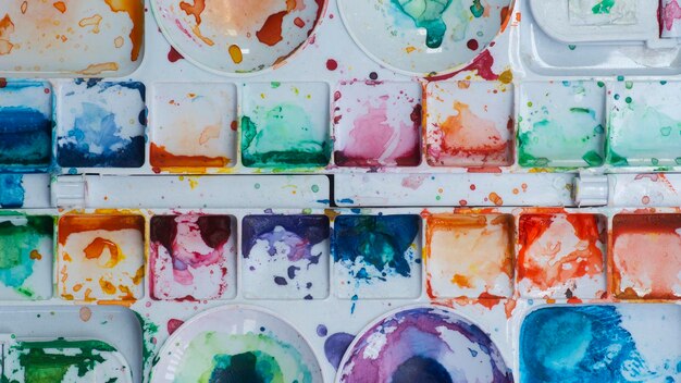 Multi colored watercolors in a palette