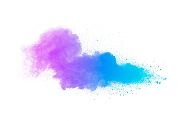 Multi colour powder explosion on white background Launched colourful dust particles splashing