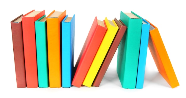 Multi-coloured books on a white background