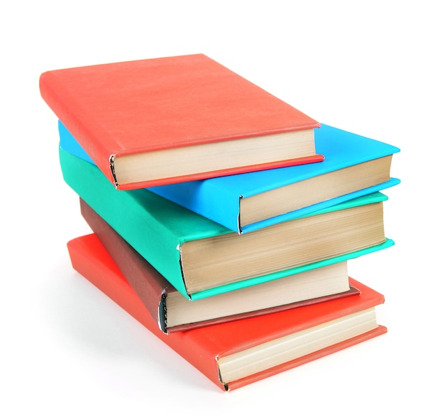 Multi-coloured books. On a white background.