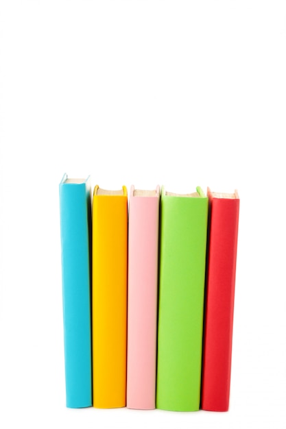 Multi coloured school books isolated on white with copy space. Back to school