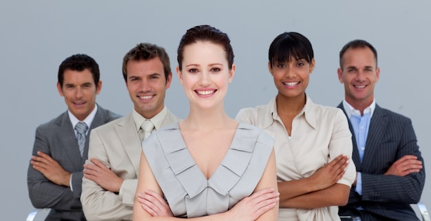 Multi-ethnic business team with folded arms