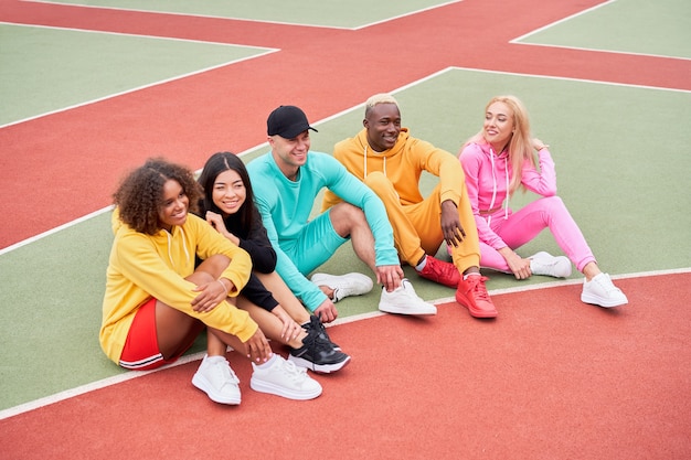 Multi-ethnic group people teenage friends. African-american, asian, caucasian student spending time together Multiracial friendship