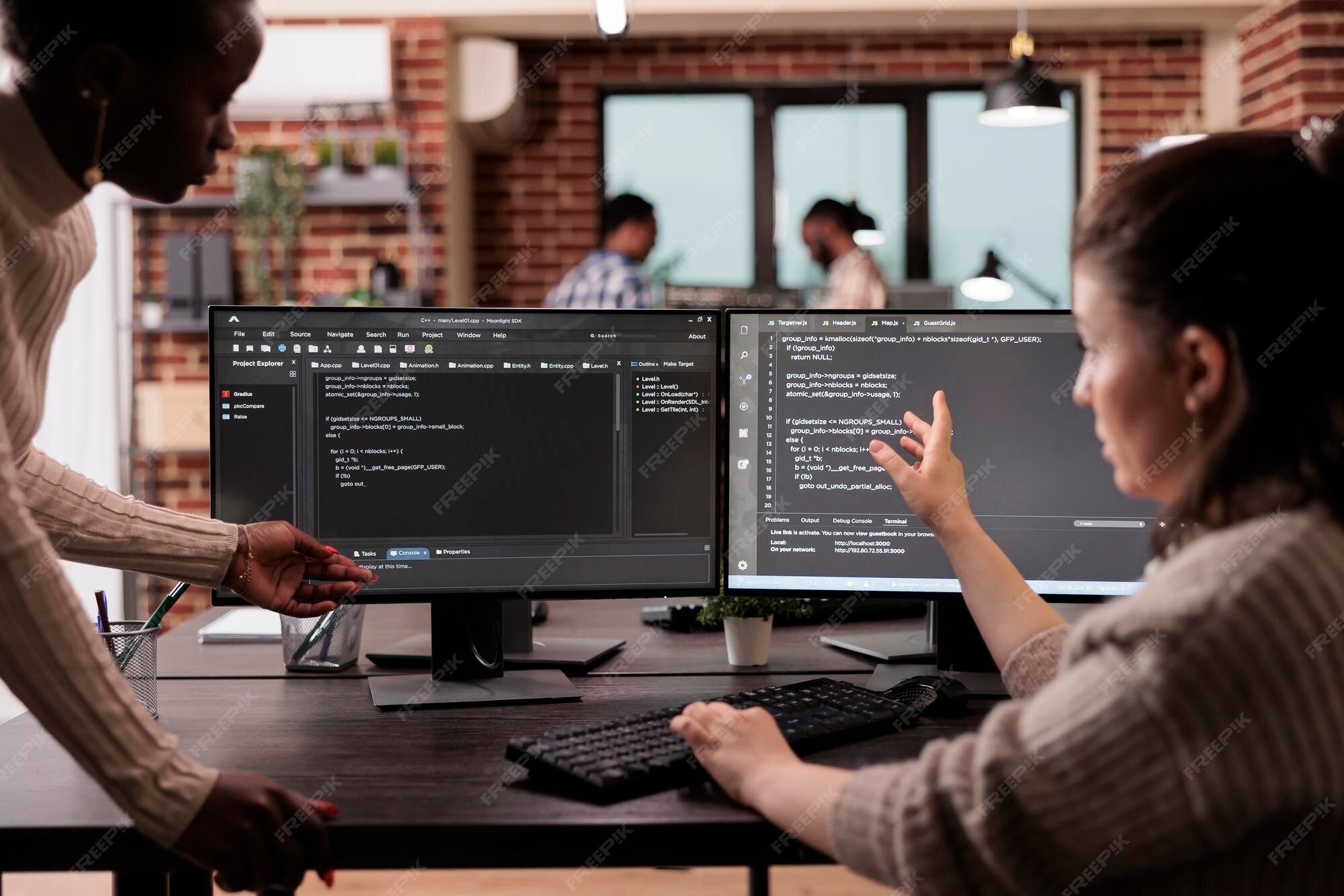 Premium Photo | Multi ethnic tech enginners developing html code and ...