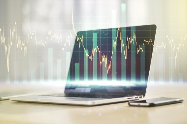 Multi exposure of abstract creative financial chart on computer background research and analytics concept