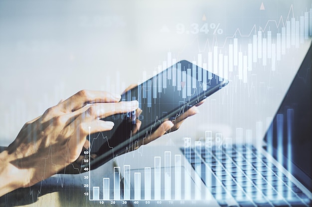 Multi exposure of abstract creative financial chart with finger presses on a digital tablet on background research and analytics concept