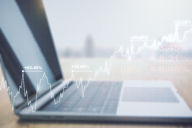 Multi exposure of abstract creative financial graph on modern computer background forex and investment concept