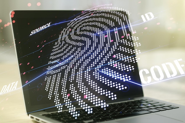 Multi exposure of abstract creative fingerprint illustration on modern laptop background digital access concept