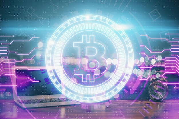 Multi exposure of blockchain theme hologram and table with computer background Concept of bitcoin crypto currency
