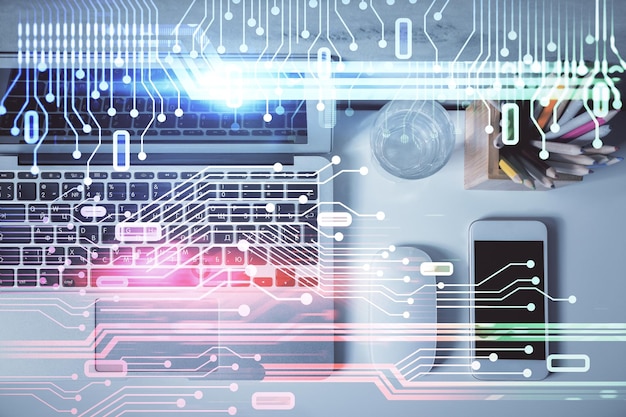 コンピューターを使用した学習机の背景の上面図にホログラムを描画するデータの多重露光技術の概念