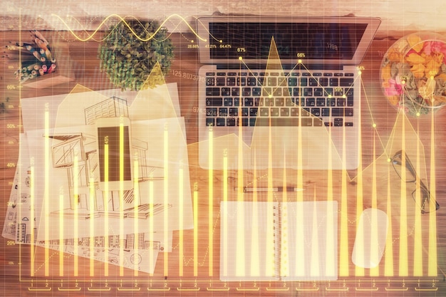 Foto esposizione multipla del grafico finanziario su sfondo di tabella con computer concetto di ricerca vista superiore