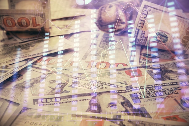 Photo multi exposure of forex chart drawing over us dollars bill background concept of financial success markets