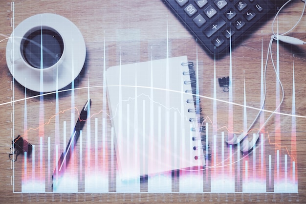 Multi exposure of forex chart drawing and work table top veiw Concept of financial analysis