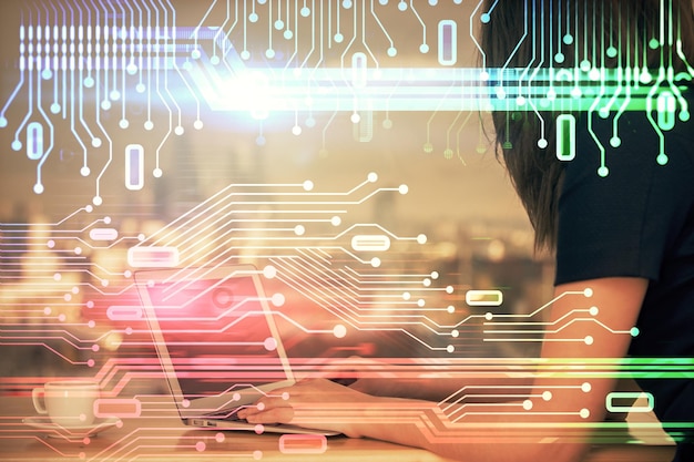 multi exposure of woman hands working on computer and data theme hologram drawing tech concept