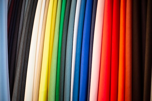 Multicolor fabric samples. Catalog of multi-colored fabric samples. Textile industry background.