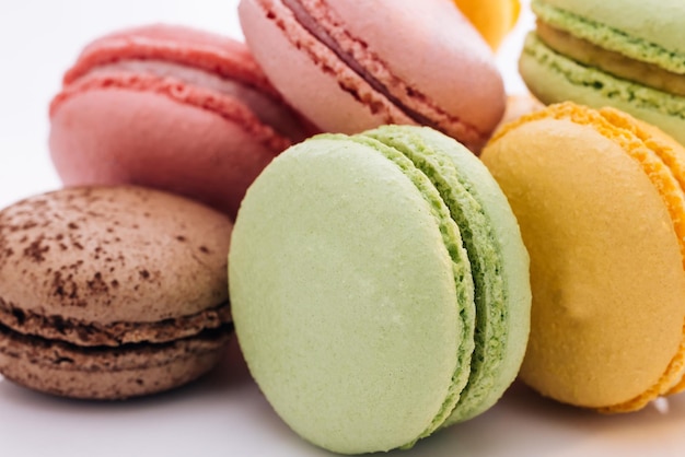 Multicolor macarons french macaroon greedy pastry close up of multicolored macarons cookies food co
