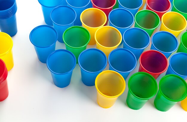 Multicolor plastic glasses isolated