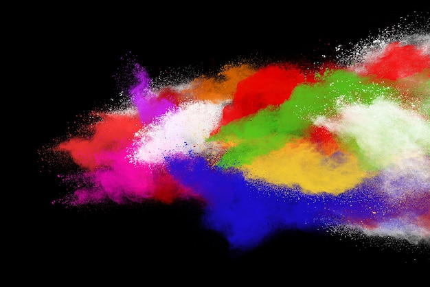 Multicolor powder explosion on black background. Colored cloud. Colorful dust explode. Pai