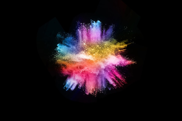 Photo multicolor powder explosion on black background.