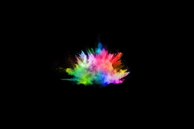 Multicolor powder explosion on black background.  