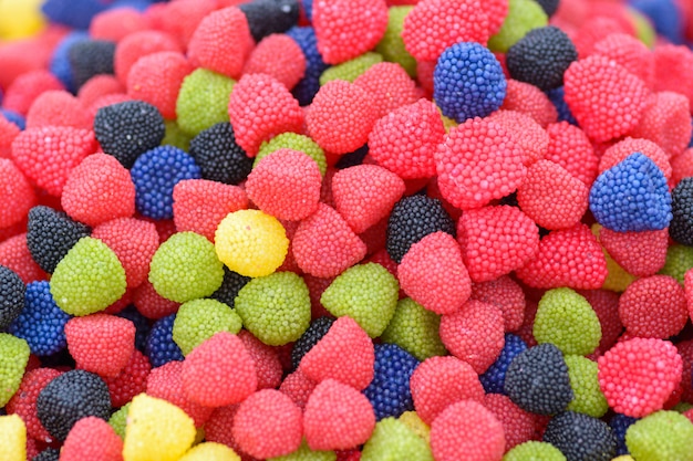 Multicolor raspberries or blackberries shaped gummy candy