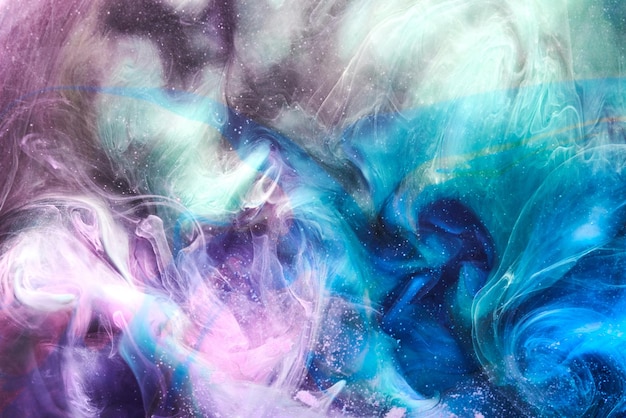 色とりどりの抽象的な煙背景ミックス アルコール インク創造的な液体アート モックアップ コピー スペース アクリル塗料の波水中