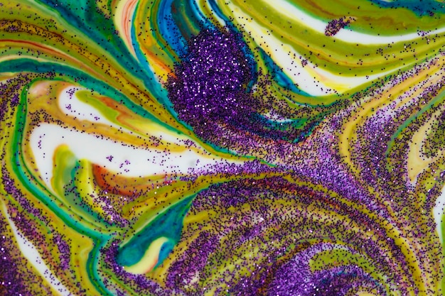 Sfondo acrilico multicolore cosparso di scintillii viola