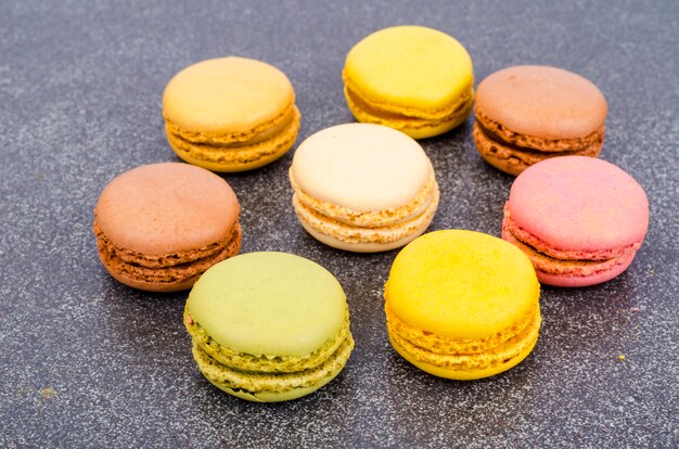 Multicolored almond french macaroons. Studio Photo