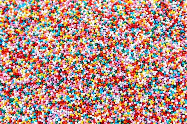 Разноцветный фон из сахарной пудры на Пасху