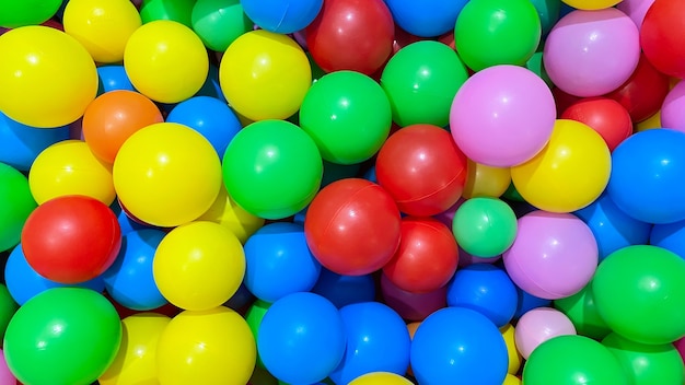 multicolored balls for a dry pool for children to play in the house and outdoors the concept of