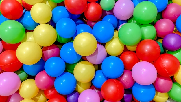 Multicolored balls for a dry pool for children to play in the house and outdoors the concept of