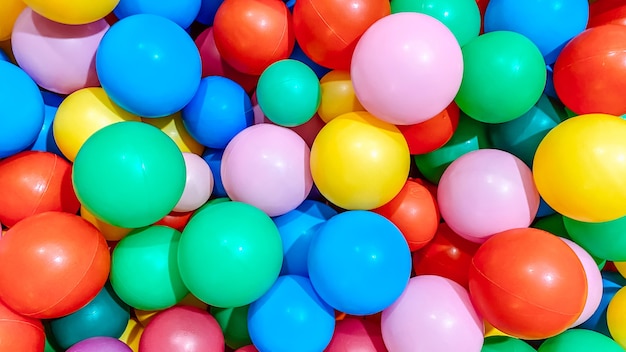 Multicolored balls for a dry pool for children to play in the house and outdoors the concept of
