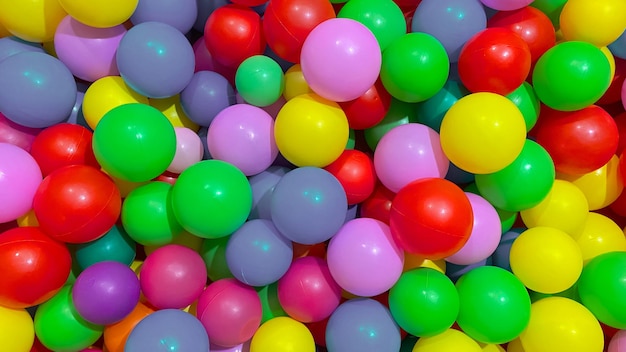 Multicolored balls for a dry pool for children to play in the house and outdoors the concept of