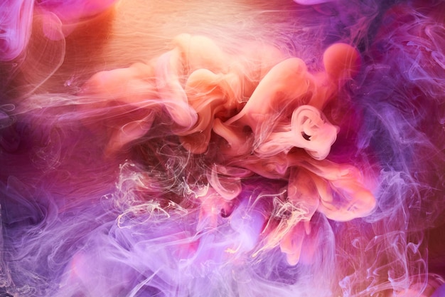Разноцветный яркий контрастный светлый дым абстрактный фон акриловая краска подводный взрыв