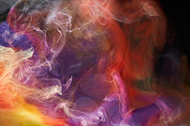 Multicolored bright contrasting dark smoke abstract background acrylic paint underwater explosion