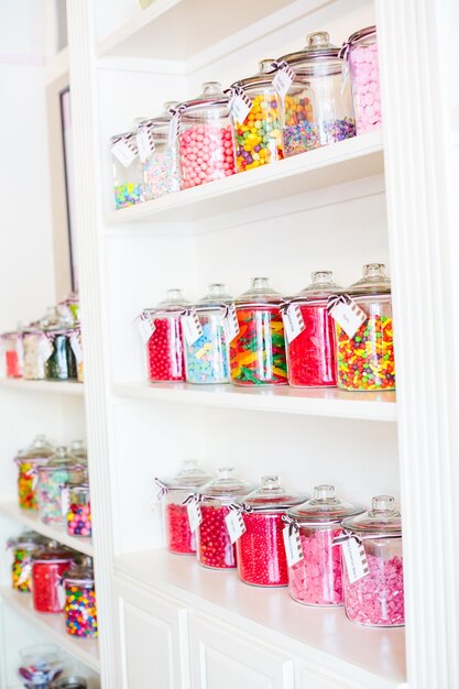 Multicolored candies on display at the candy store.