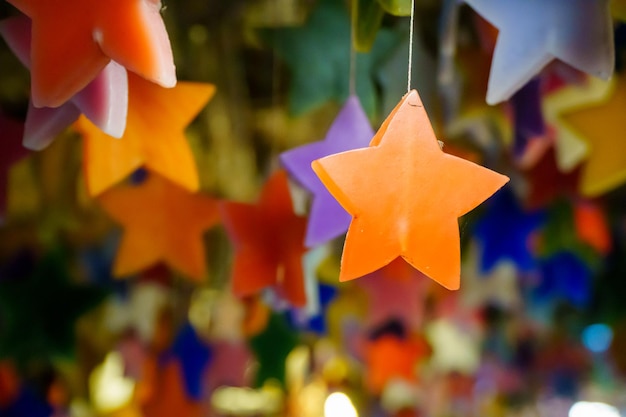 Multicolored candles cast in the shape of a star