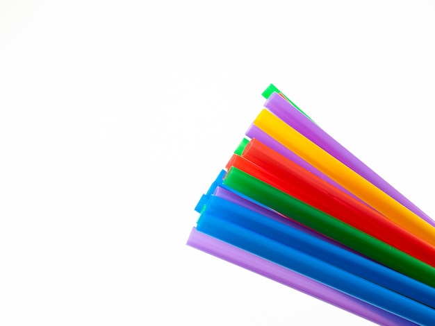 Multicolored cocktail tubes isolated on white background