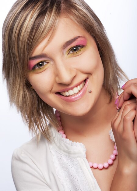 Multicolored creativity make-up. young beautiful woman.