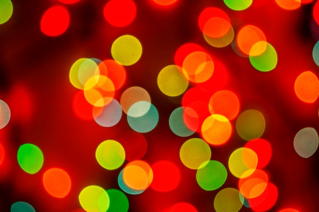 Foto bokeh sfocato multicolore luci sfocate sfondo festivo delle luci di natale