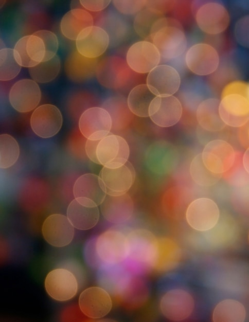 Multicolored defocused bokeh lichtenachtergrond