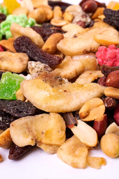 Multicolored dried fruits closeup background or texture