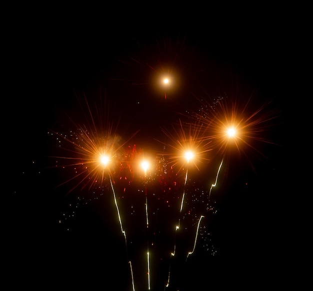 Multicolored fireworks on a background of night sky. holiday background.