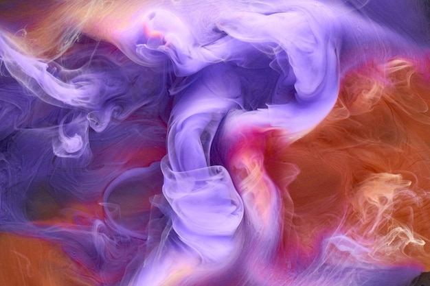 Multicolored orange lilac smoke abstract background acrylic\
paint underwater explosion