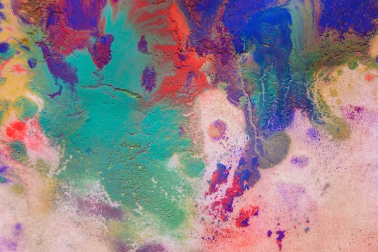 Photo multicolored paint stains drips splashes mixing. abstract background