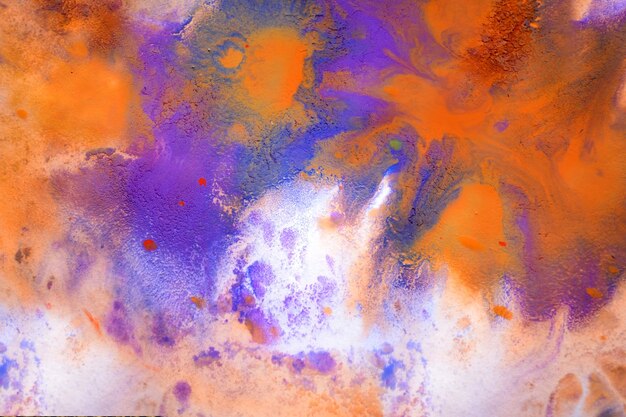 Multicolored paint stains drips splashes mixing abstract background