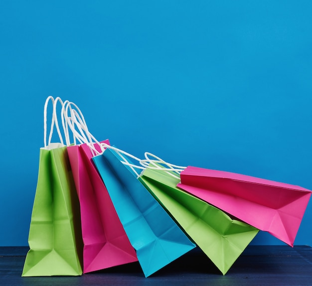 Multicolored paper bags with a handle for shopping and gifts