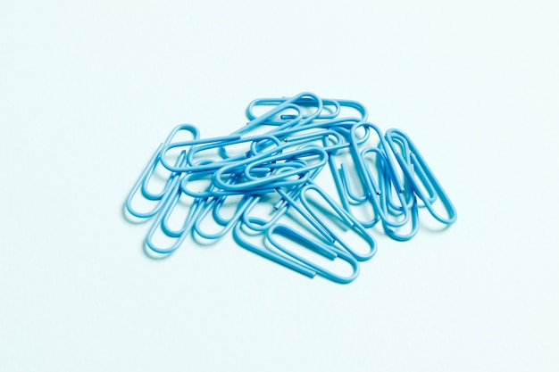 Multicolored paper clips isolated on white background