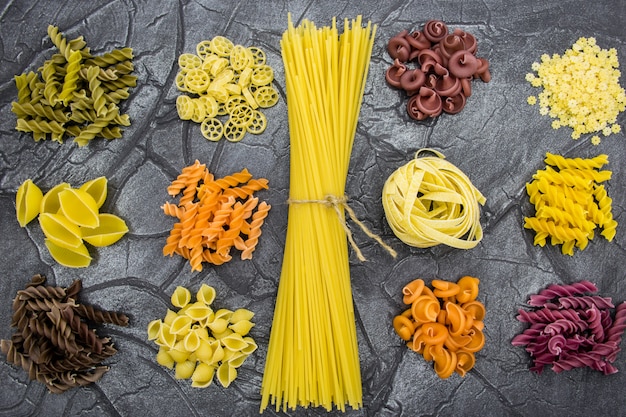 Multicolored pasta close-up. Pasta of different shapes.