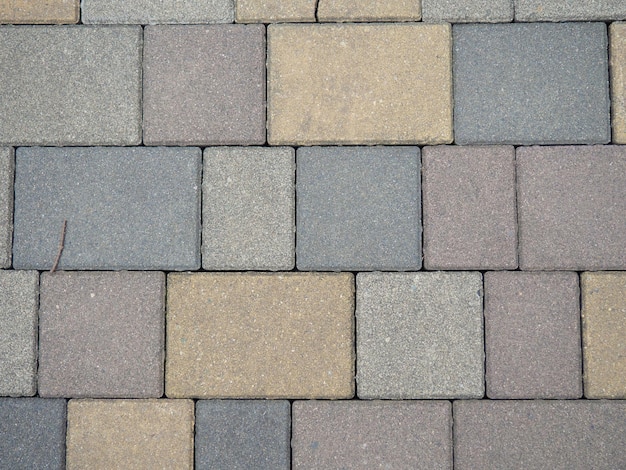 Multicolored pavement Stones on the pavement Pavement tiles background